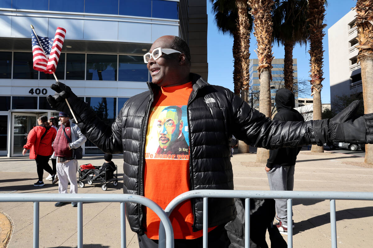 Las Vegas entertainer Larry Edwards watches the 43rd annual Martin Luther King Jr. Day parade i ...