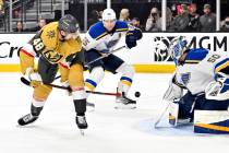 Vegas Golden Knights center Tomas Hertl (48) shoots from between his legs against St. Louis Blu ...