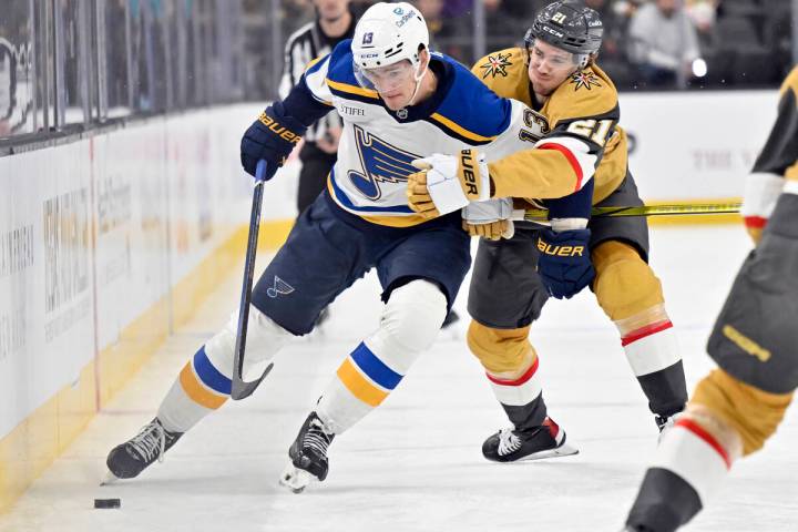 St. Louis Blues right wing Alexey Toropchenko (13) and Vegas Golden Knights center Brett Howden ...