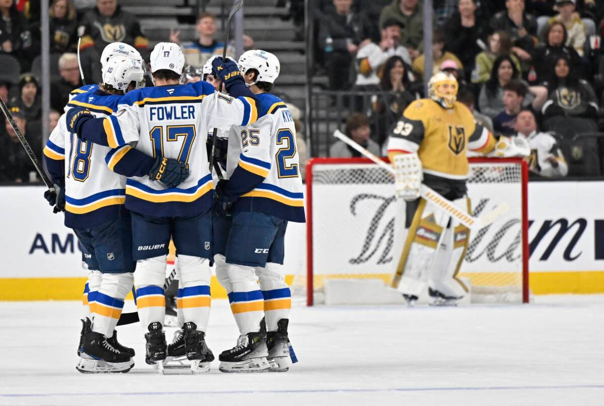 The St. Louis Blues celebrate after a goal by defenseman Cam Fowler (17) against the Vegas Gold ...