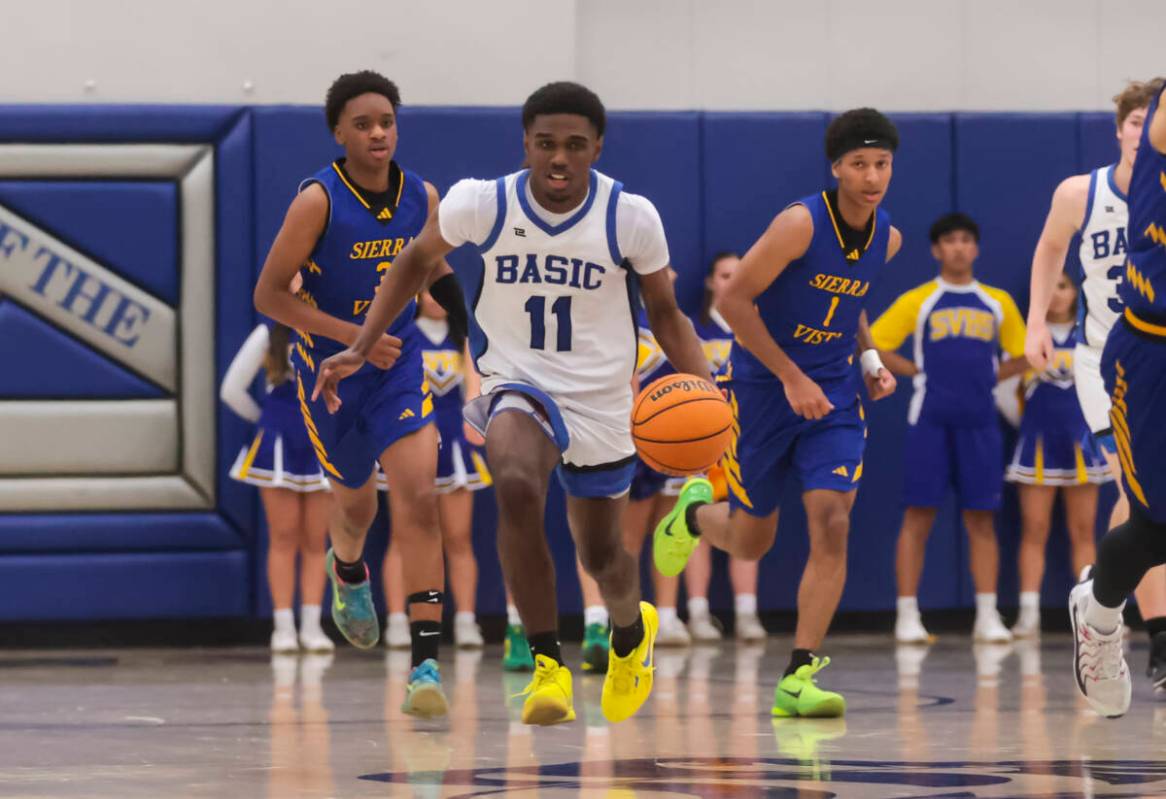 Basic guard JaMari Cottingham (11) drives the ball against Sierra Vista during a basketball gam ...