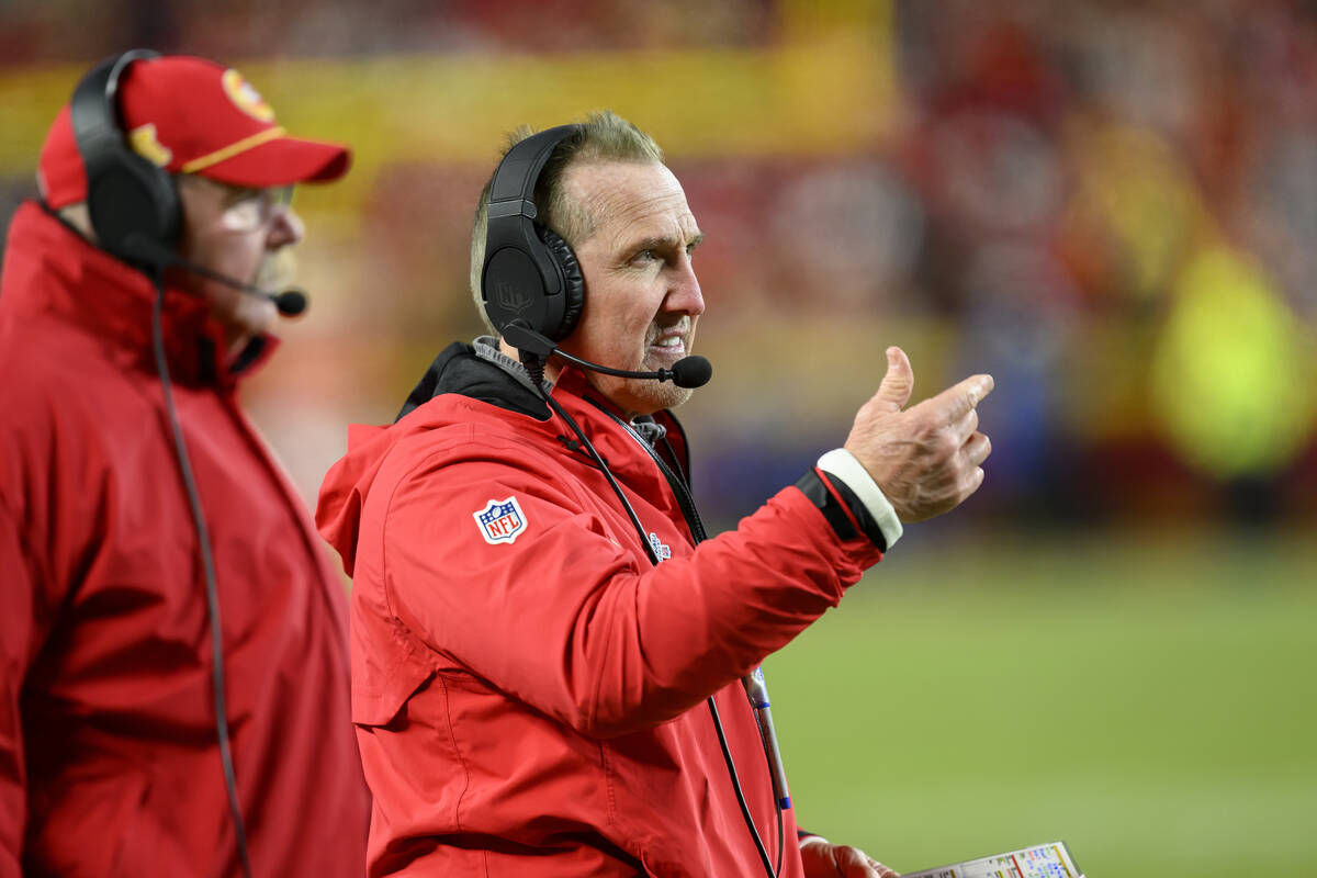 Kansas City Chiefs defensive coordinator Steve Spagnuolo calls out directions to his unit as he ...