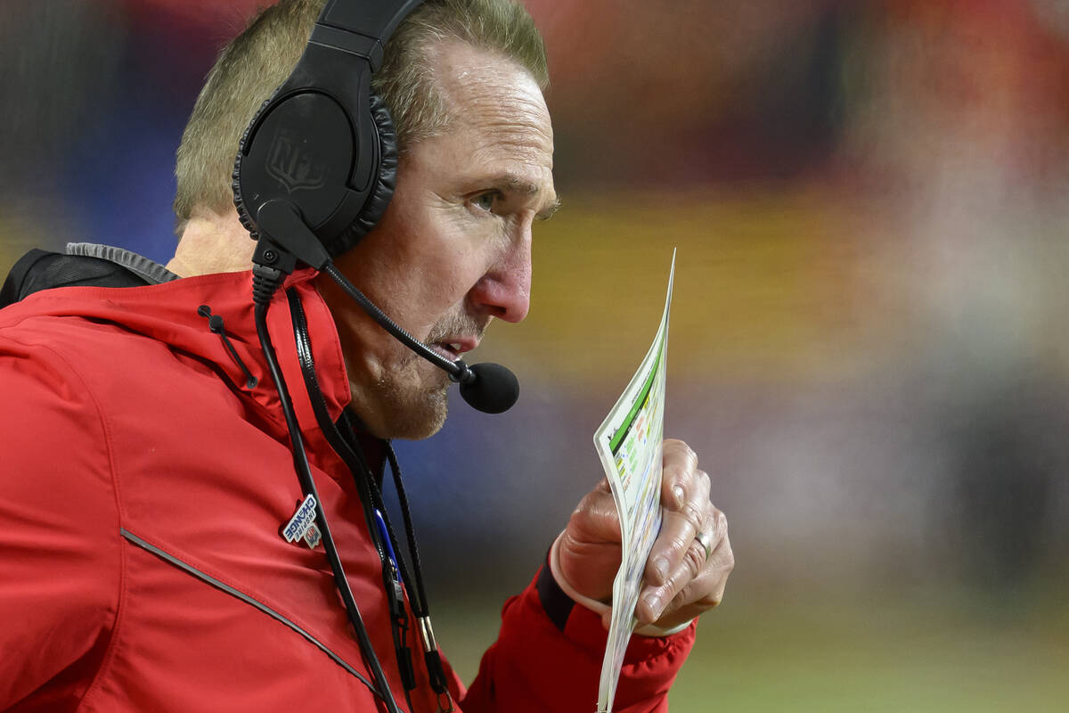 Kansas City Chiefs defensive coordinator Steve Spagnuolo calls out directions to his unit durin ...