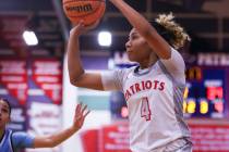 Liberty’s Satsuki Bradley (4) shoots a three pointer during a basketball game between Li ...