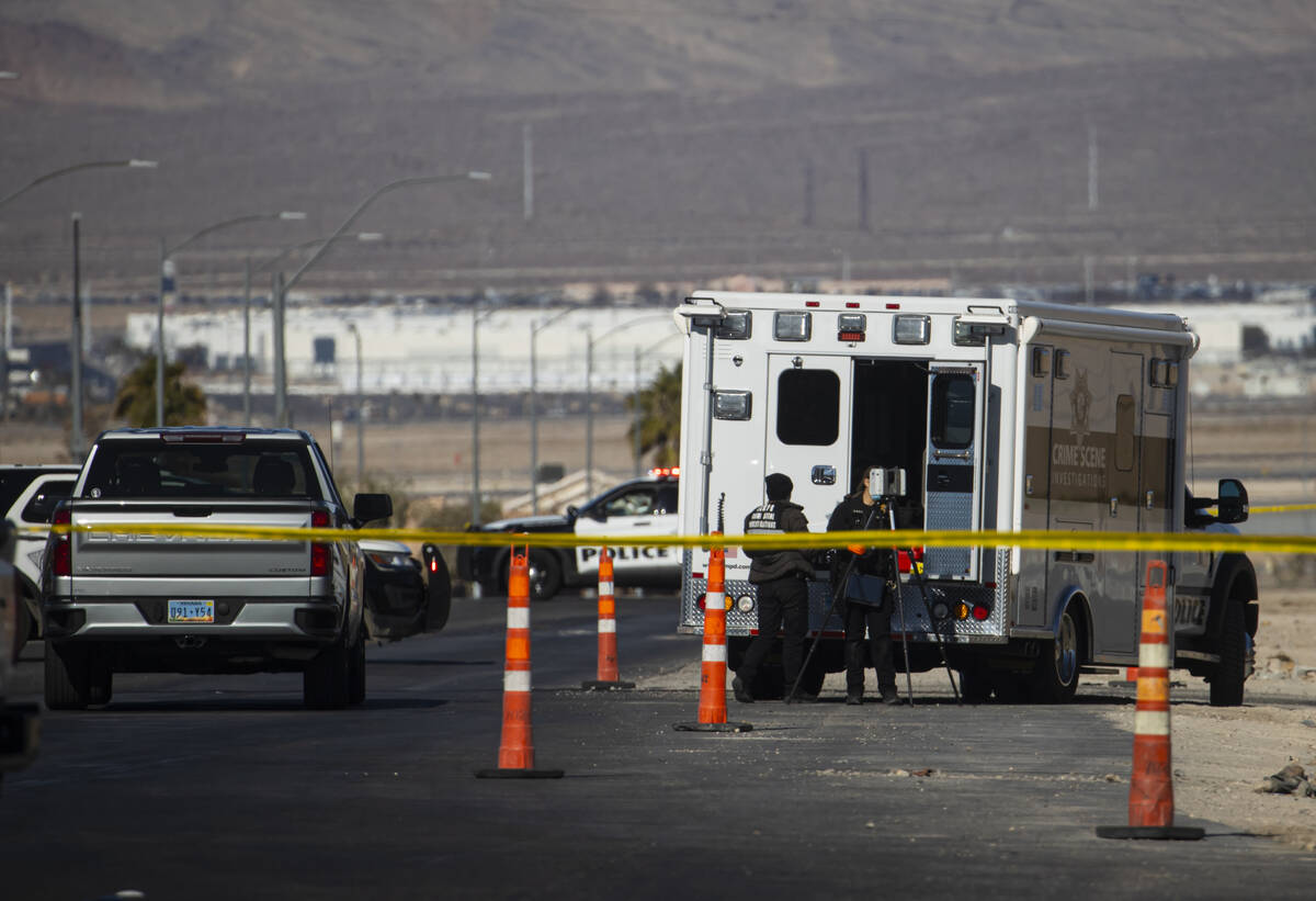 Las Vegas police investigate the scene of a homicide at the 2600 block of North Hollywood Boule ...