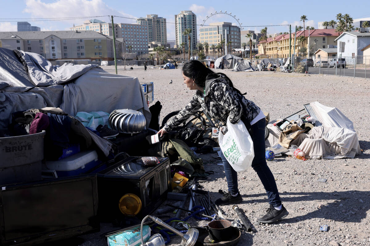 FILE - Brenda Barnes, Clark County social service assistant manager, drops of water and food du ...