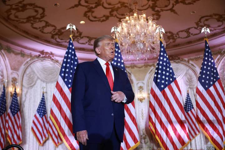 Donald Trump arrives on stage to speak during an event at his Mar-a-Lago home. (Joe Raedle/Gett ...