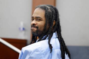 Anthony Newton, who's facing the death penalty for a 2016 murder, smiles following a hung jury ...