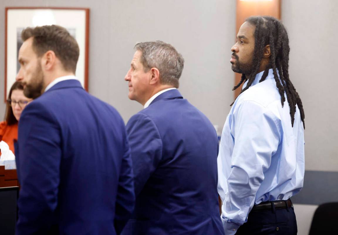 Anthony Newton, right, who's facing the death penalty for a 2016 murder, appears in court with ...