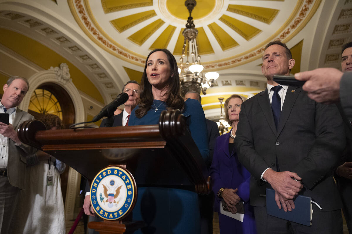 Sen. Katie Britt, R-Ala., speaks to reporters on Capitol Hill, Tuesday, Jan. 14, 2025, in Washi ...