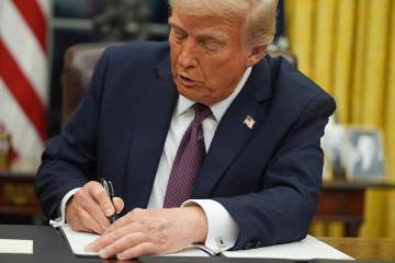 President Donald Trump signs an executive order on birthright citizenship in the Oval Office of ...