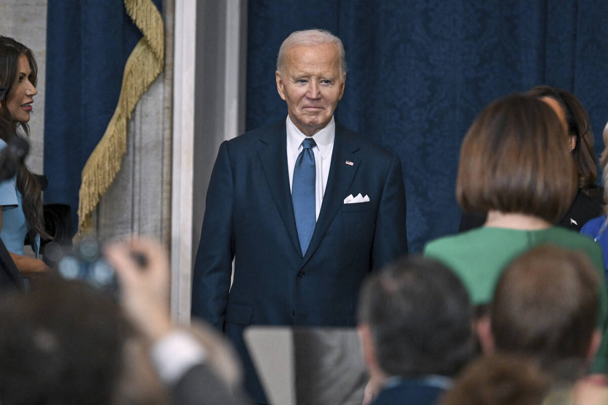 President Joe Biden arrives for the 60th Presidential Inauguration in the Rotunda of the U.S. C ...