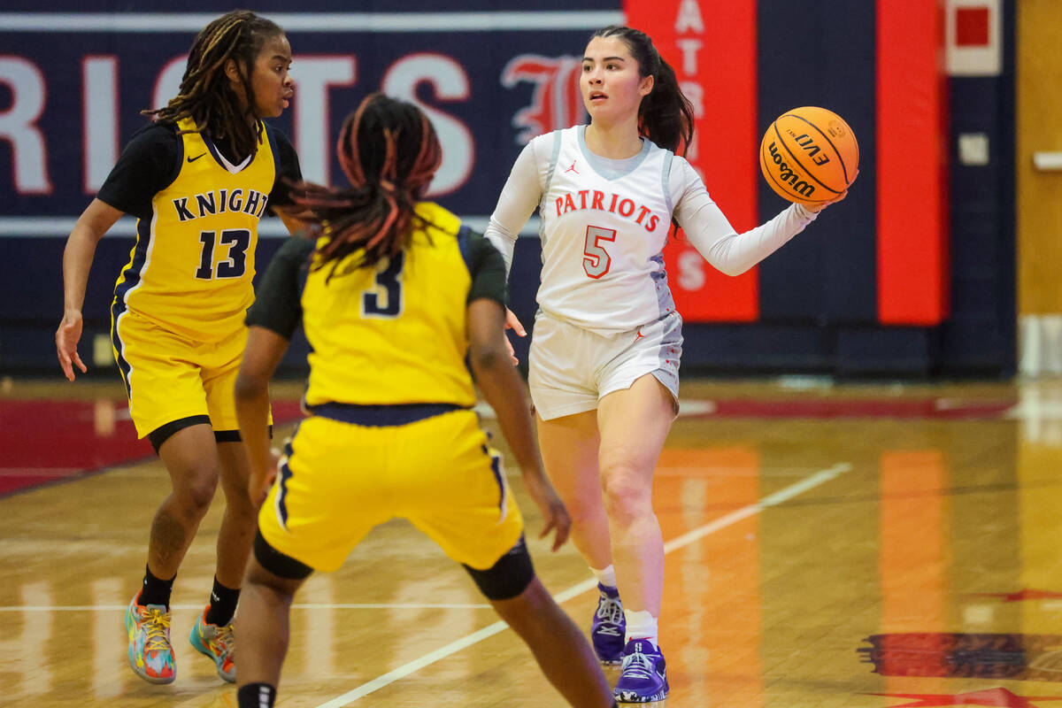 Liberty guard Samantha Chesnut (5) looks for an open teammate during a girls basketball game be ...