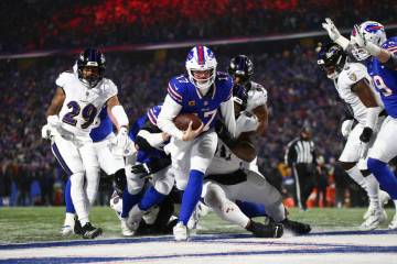 Buffalo Bills quarterback Josh Allen (17) runs into the endzone for a touchdown during to the f ...