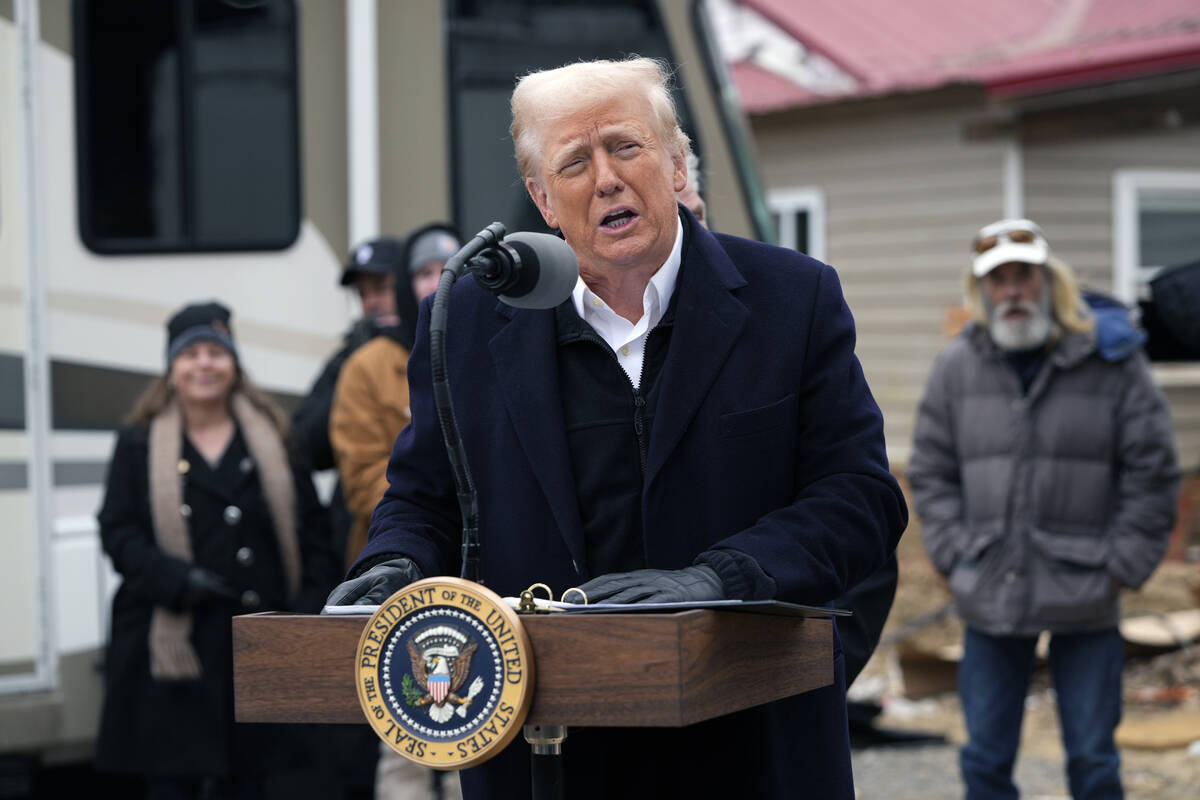 President Donald Trump speaks as he meets with homeowners affected by Hurricane Helene in Swann ...