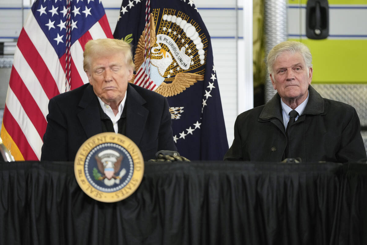 President Donald Trump is briefed on the effects of Hurricane Helene at Asheville Regional Airp ...