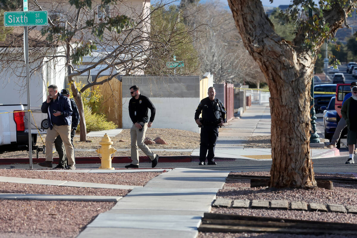 Police investigate a shooting involving an off-duty Metropolitan Police Department officer on S ...