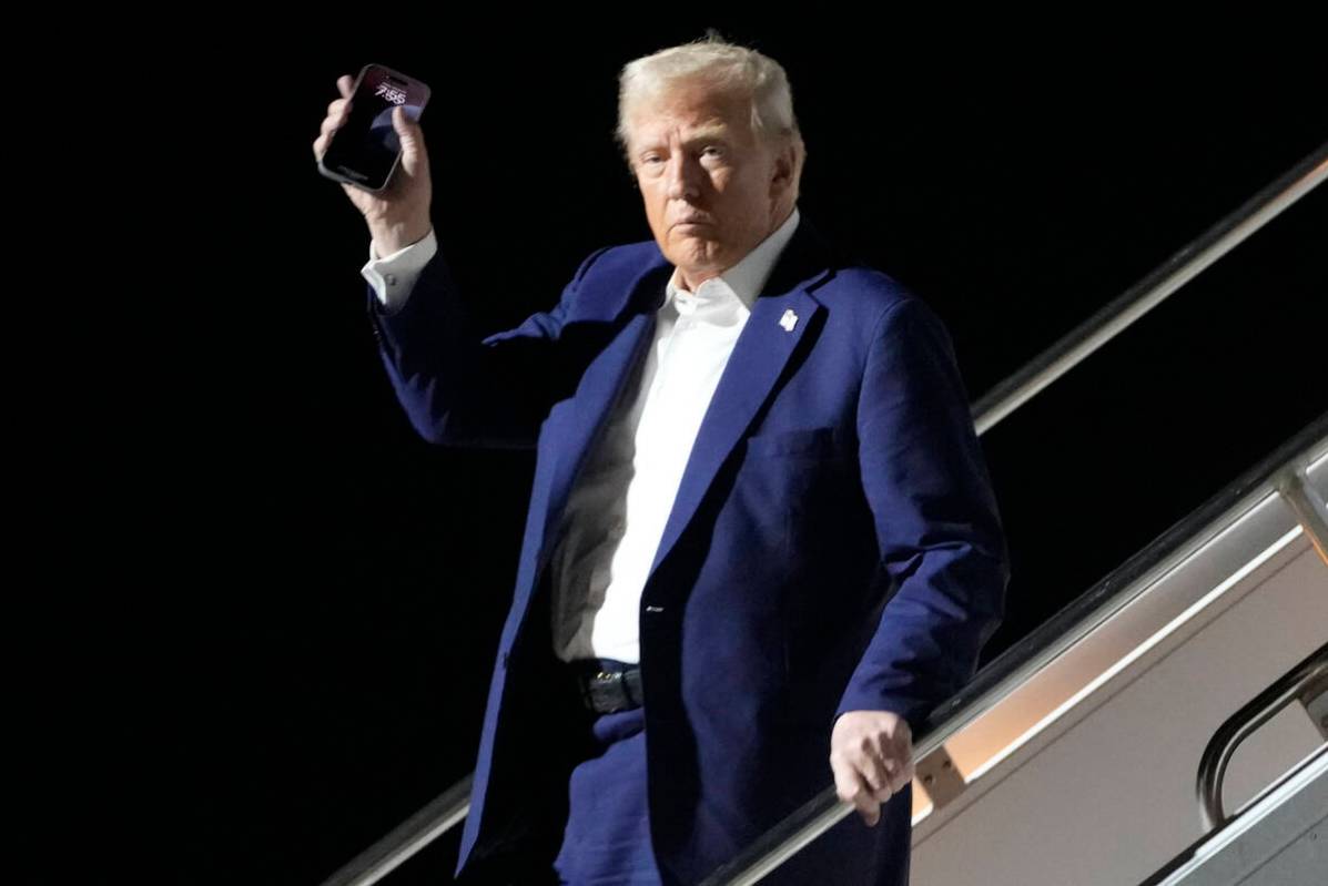 President Donald Trump arrives on Air Force One at Harry Reid International Airport in Las Vega ...