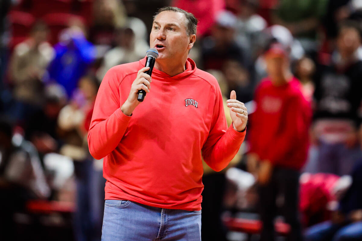 New Rebels football coach Dan Mullen hypes up the crowd for a new football season during a time ...