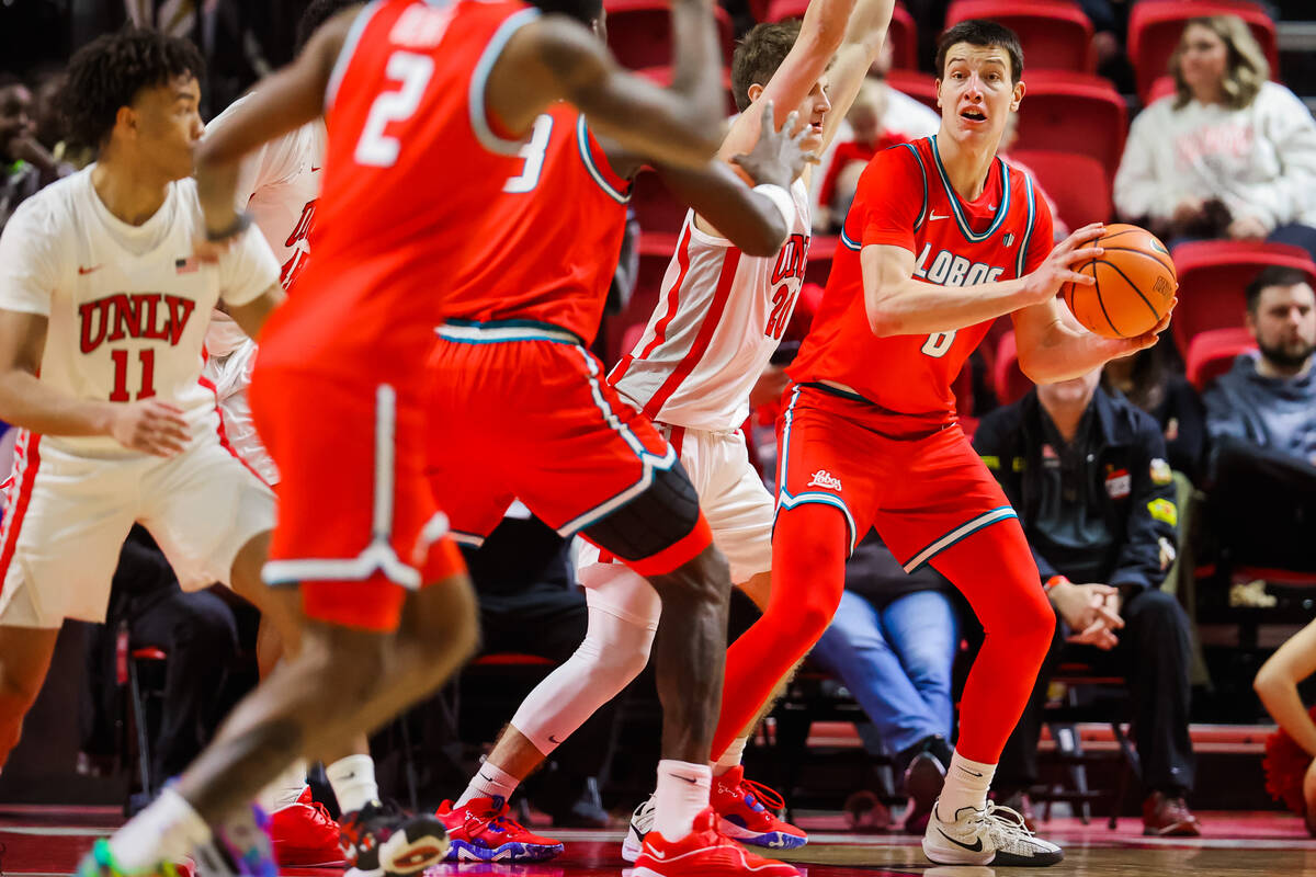 New Mexico Lobos forward Filip Borovicanin (8) looks for an open teammate during an NCAA basket ...