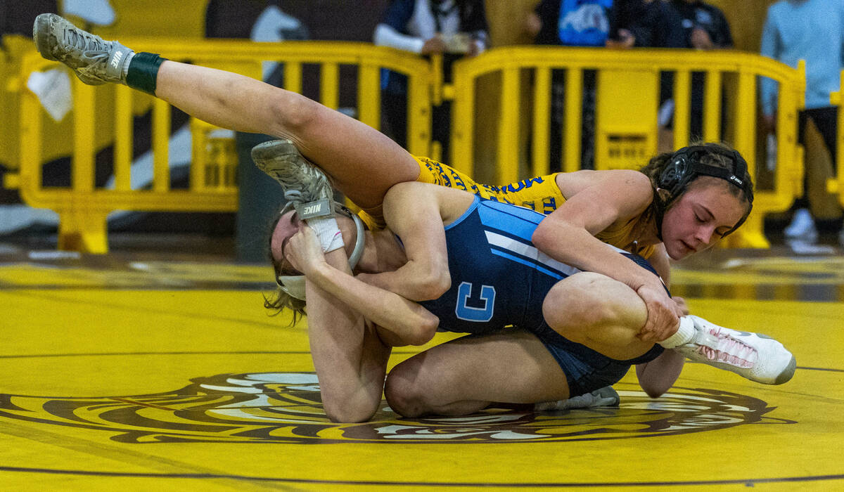 Centennial’s Kaydyn Brooks and Moapa Valley’s Anna Winward work for an advantage ...