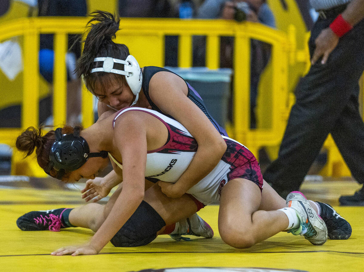 SLAM Academy’s Bertha Cabrera dominates Desert Oasis' Hazel Garcia during their 105 poun ...