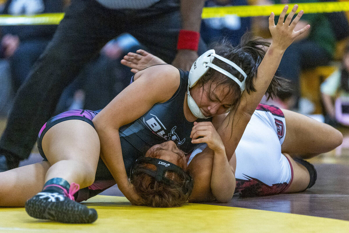 SLAM Academy’s Bertha Cabrera pins Desert Oasis' Hazel Garcia during their 105 pound mat ...