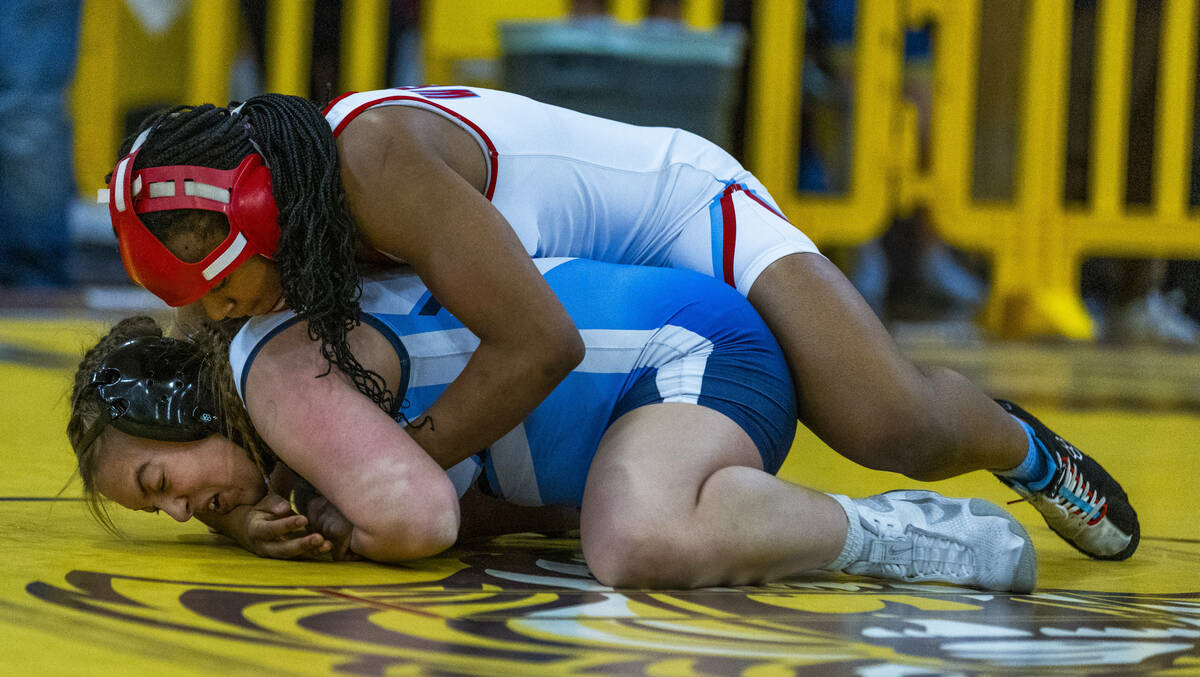 Western’s I’yanna Jones gets atop of Centennial’s Madison Worden during th ...