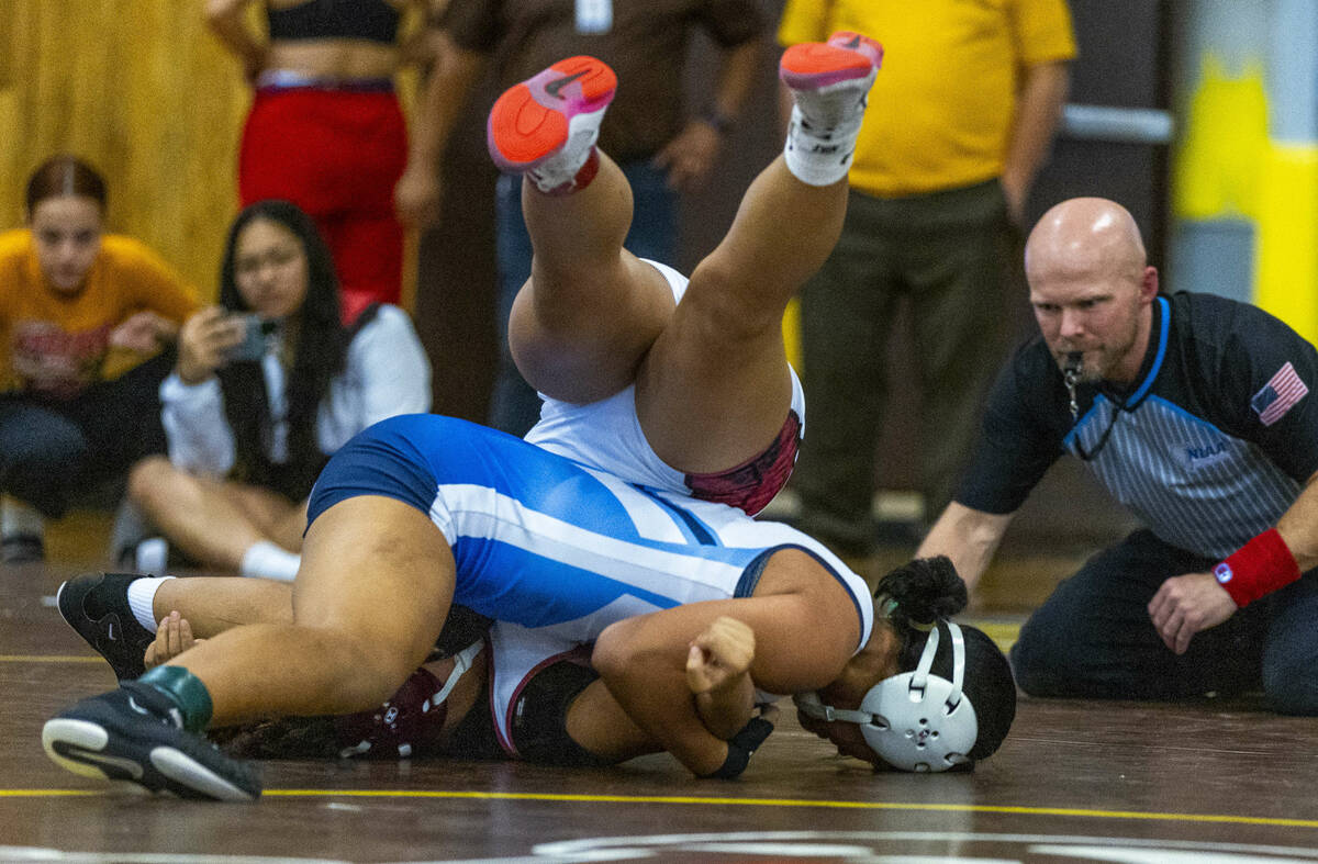 Centennial’s Sandilynn Paopao gets atop of Desert Oasis’ Noelani Almogela durin ...