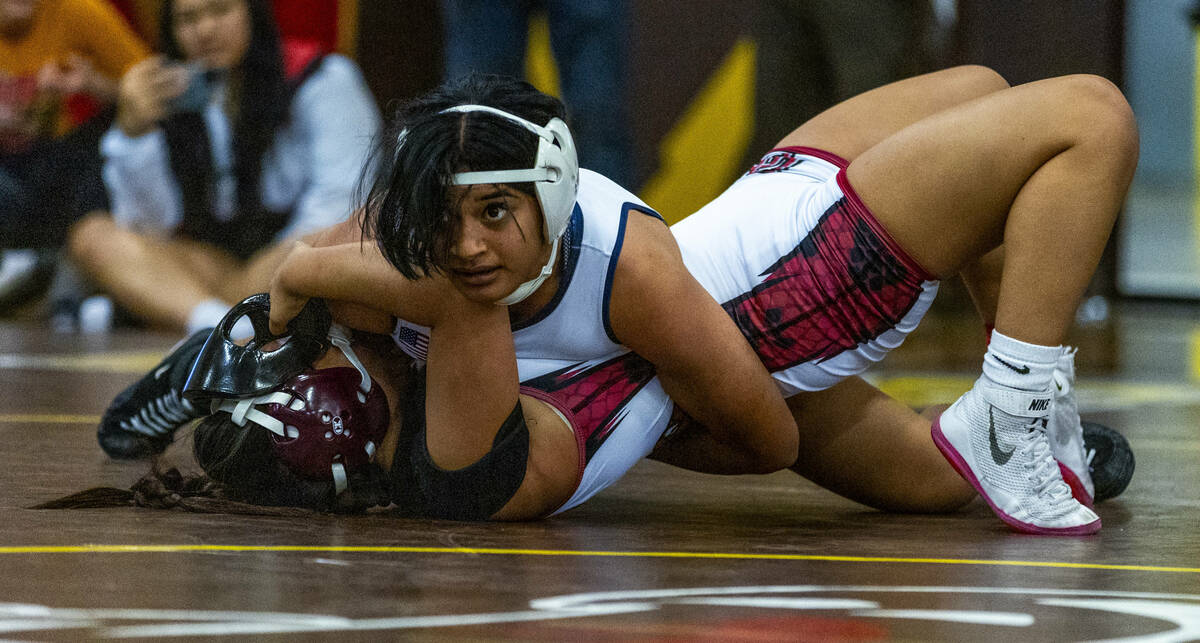 Centennial’s Sandilynn Paopao pins Desert Oasis’ Noelani Almogela during their 14 ...