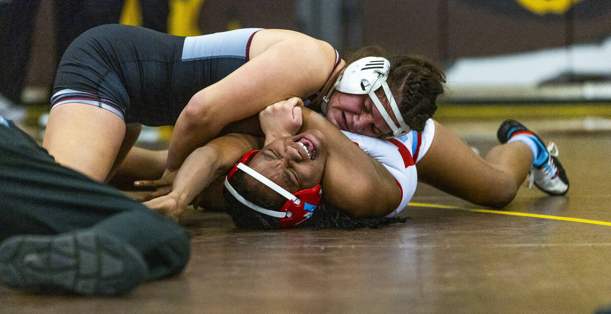 Cimarron-Memorial’s Addison Canja pins Western’s Jordan Hunter during their 155 p ...