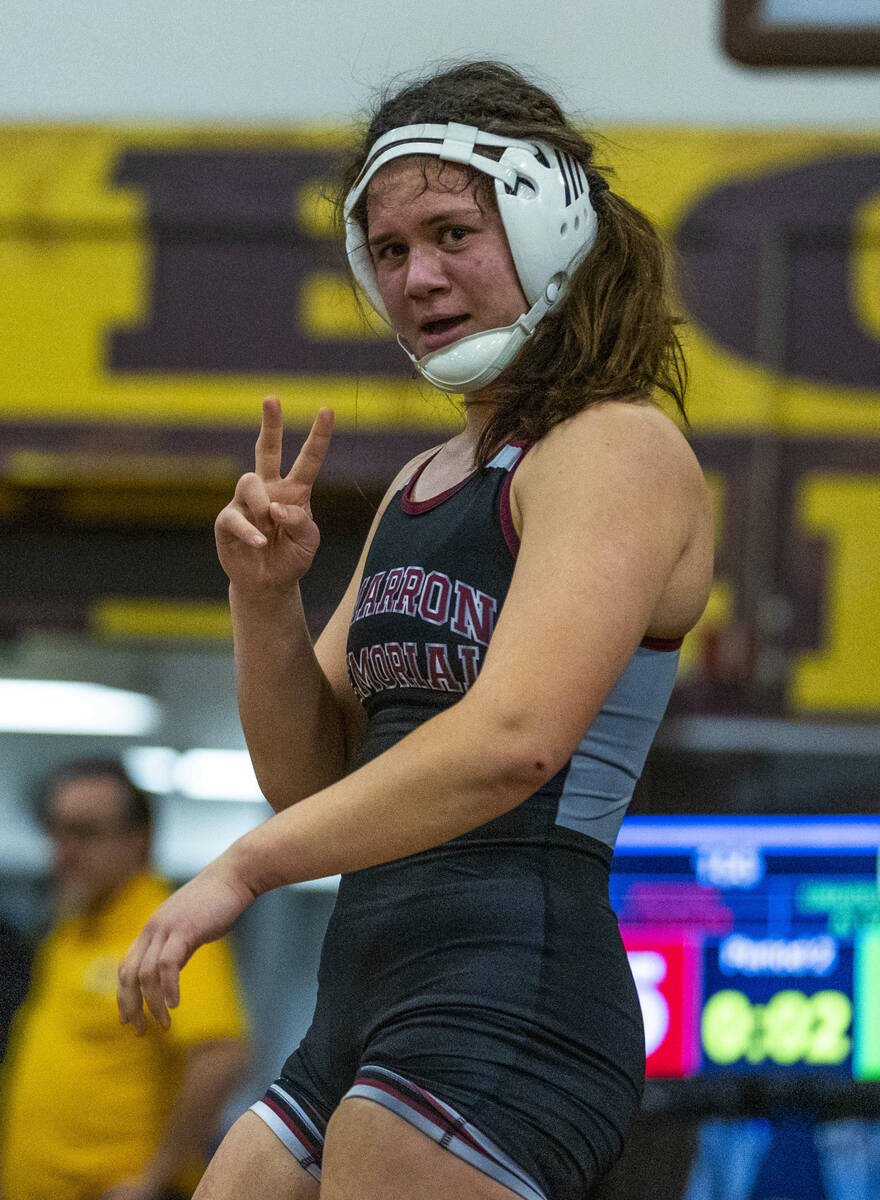 Cimarron-Memorial’s Addison Canja is pleased after a pin over Western’s Jordan Hu ...