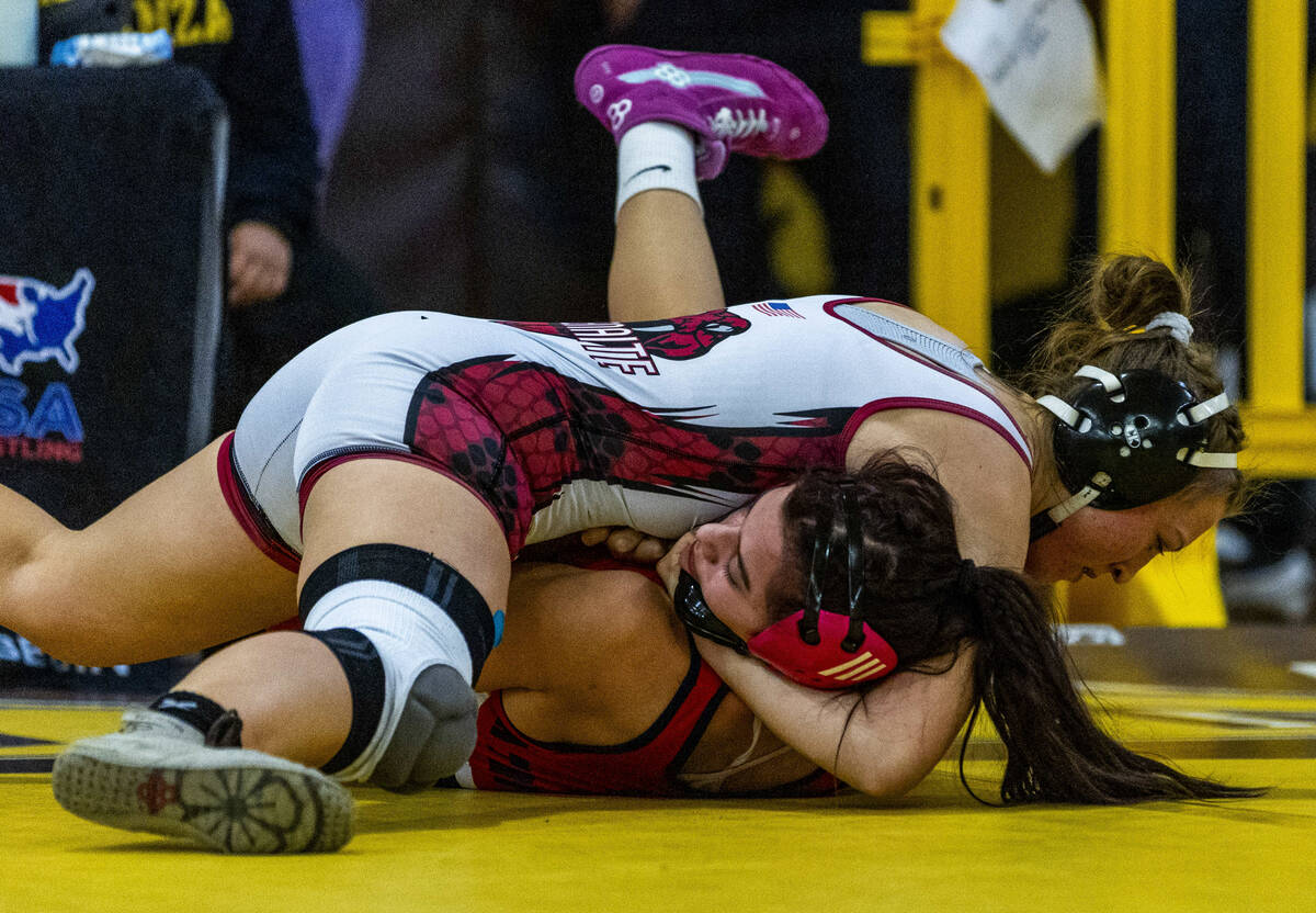 Desert Oasis’ Evelina Juzenaite works to pin Liberty’s Yulliana Quiroga during th ...