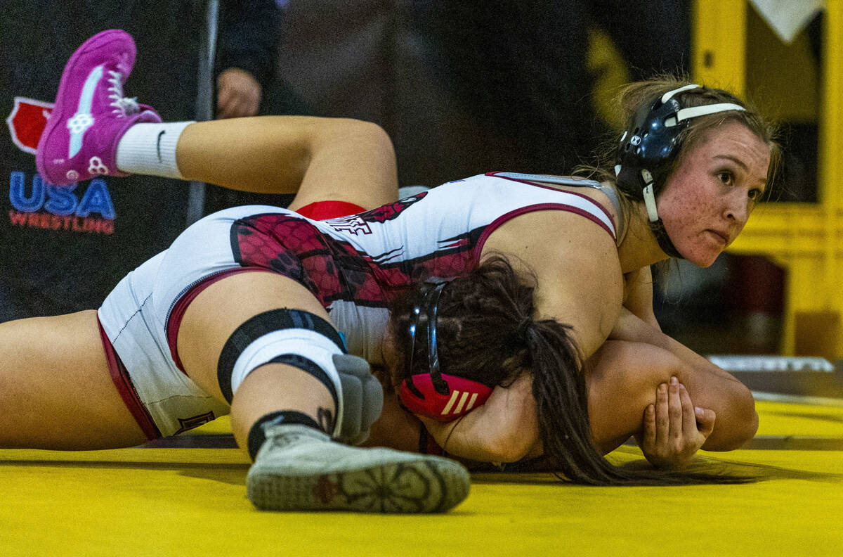 Desert Oasis’ Evelina Juzenaite works to pin Liberty’s Yulliana Quiroga during th ...