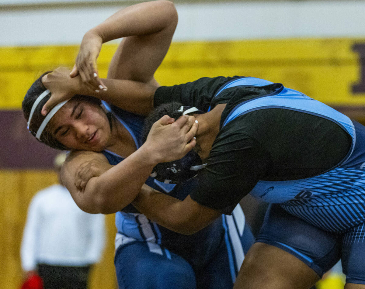 Centennial’s Kitana Leafaatoto Canyon Springs’ Isabella Gray during their 235 po ...