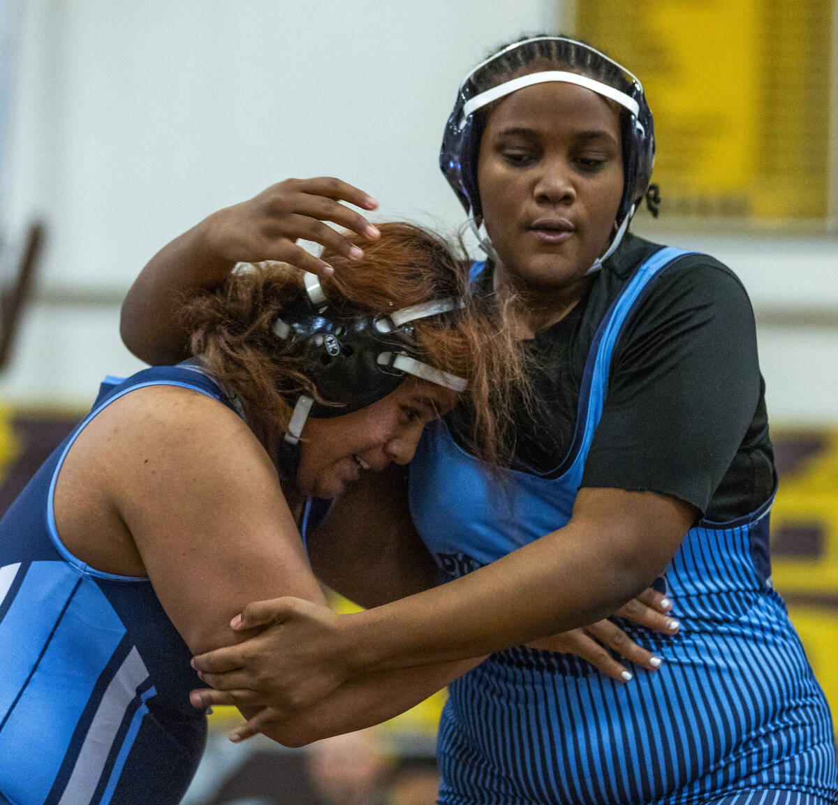 Centennial’s Kitana Leafaatoto grapples with Canyon Springs’ Isabella Gray during ...