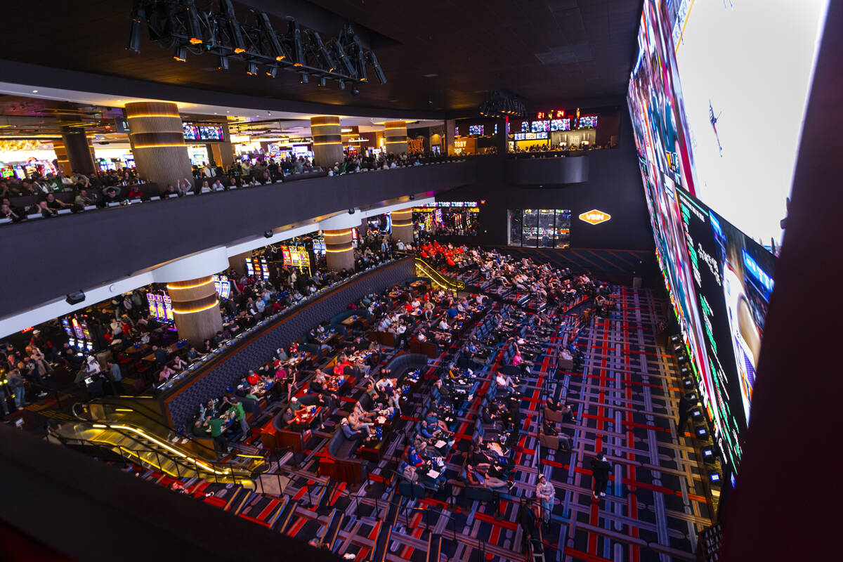 People watch the NFC championship football game between the Philadelphia Eagles and Washington ...