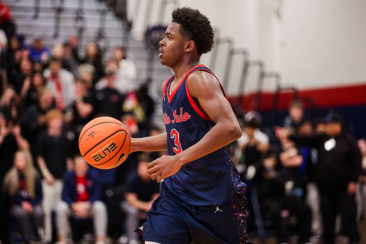 Coronado’s Jalen St. Clair dribbles the ball during a high school boys basketball game b ...