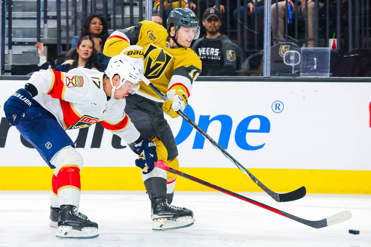 Golden Knights left wing Pavel Dorofeyev (16) races against Florida Panthers center Evan Rodrig ...