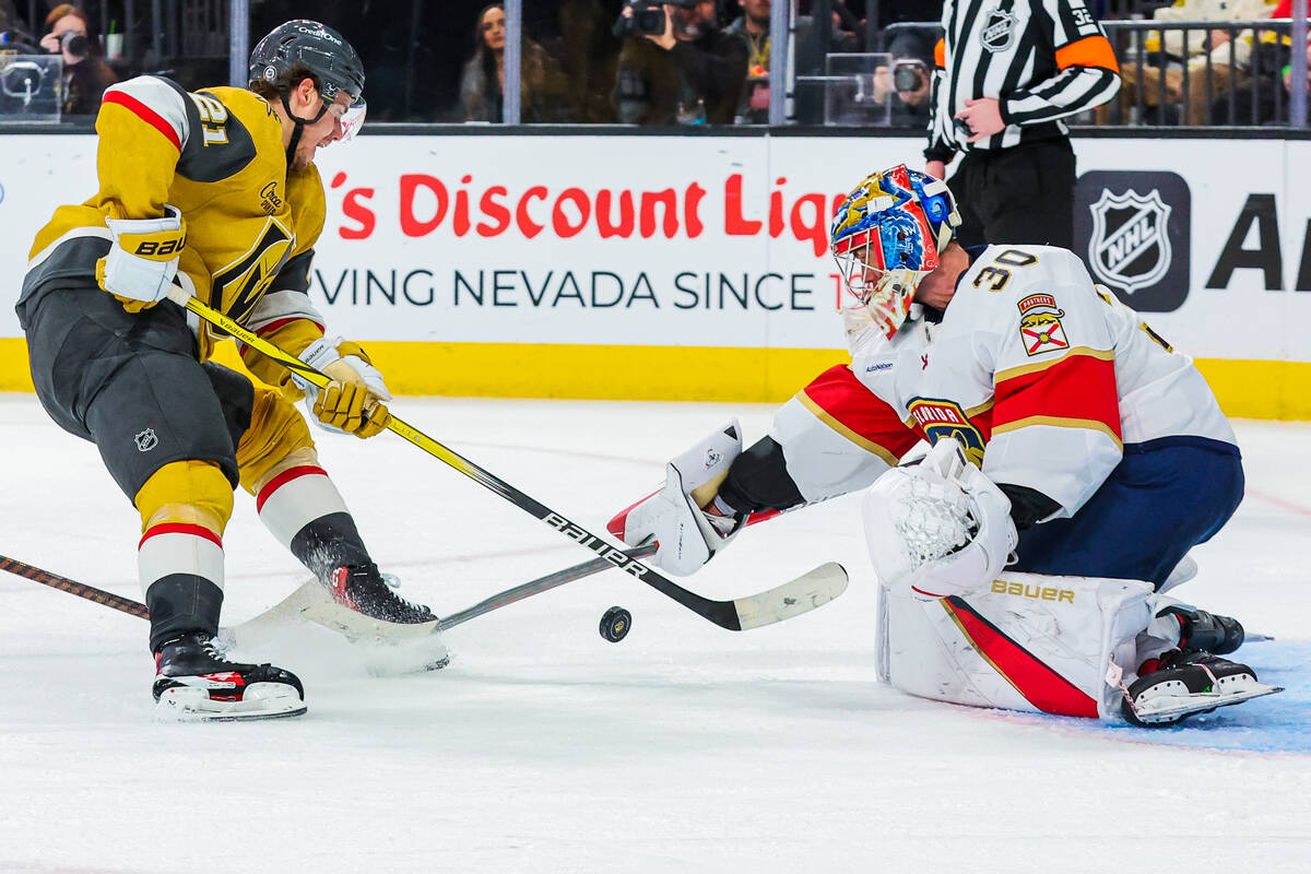 Golden Knights center Brett Howden (21) attempts a goal against Florida Panthers goaltender Spe ...