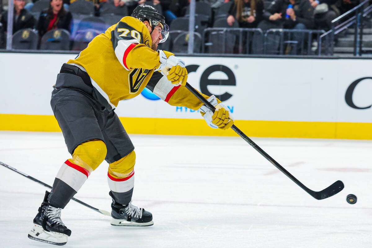 Golden Knights left wing Tanner Pearson (70) pushes the puck forward during an NHL hockey game ...