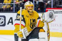 Golden Knights goaltender Adin Hill (33) takes a moment after making a save during an NHL hocke ...