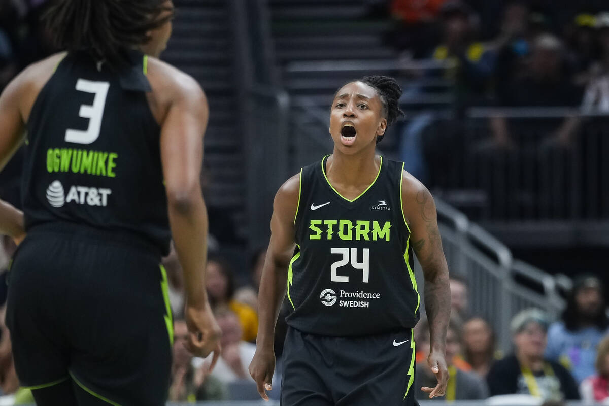 Seattle Storm guard Jewell Loyd reacts towards forward Nneka Ogwumike (3) during a WNBA basketb ...