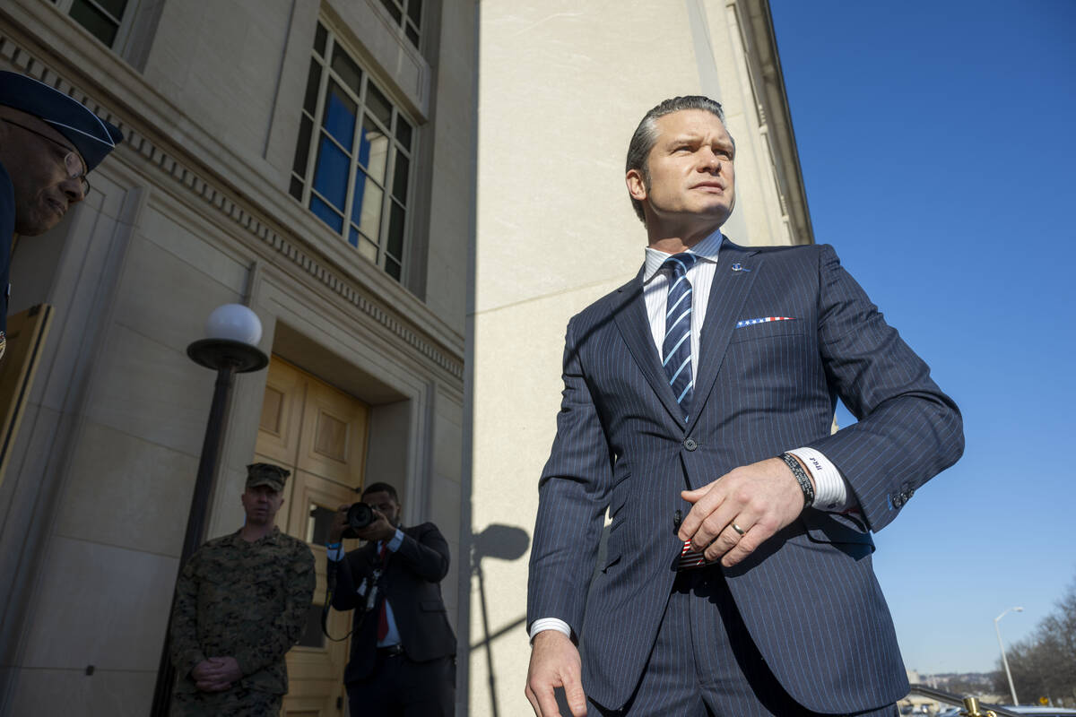 Defense Secretary Pete Hegseth arrives at the Pentagon, Monday, Jan. 27, 2025 in Washington. (A ...