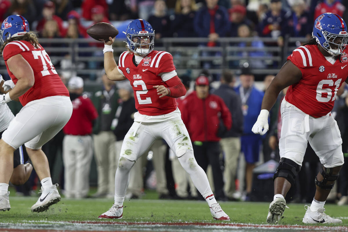 Mississippi quarterback Jaxson Dart (2) throws a pass during the first quarter of the Gator Bow ...