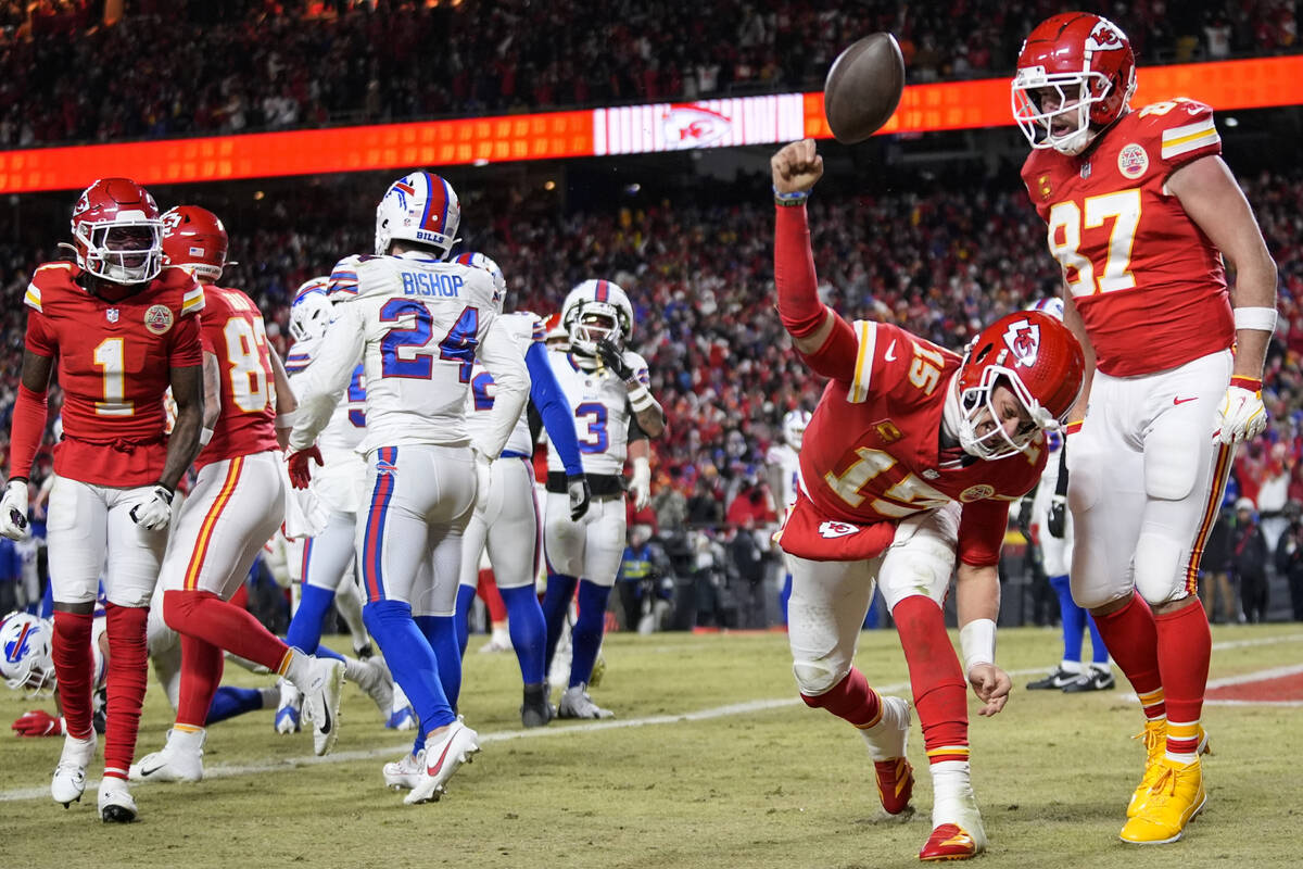 Kansas City Chiefs quarterback Patrick Mahomes (15) celebrates his touchdown with Kansas City C ...