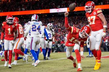 Kansas City Chiefs quarterback Patrick Mahomes (15) celebrates his touchdown with Kansas City C ...