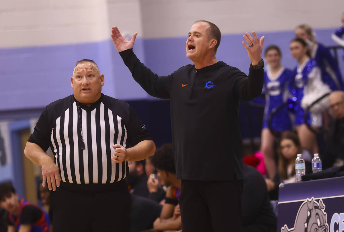 Bishop Gorman head coach Grant Rice reacts to a play during a basketball game at Centennial Hig ...