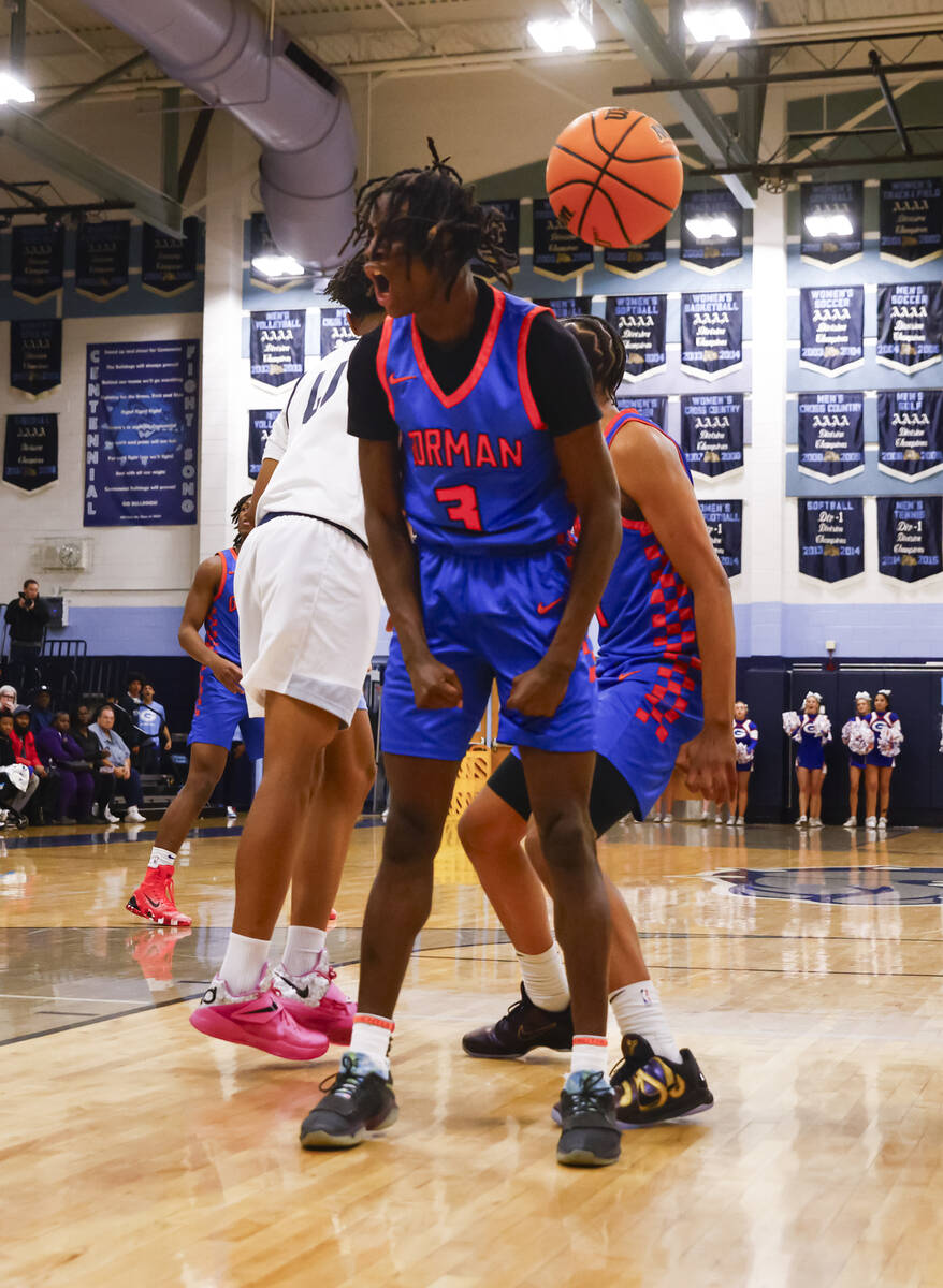 Bishop Gorman guard Ty Johnson reacts after a play during a basketball game at Centennial High ...