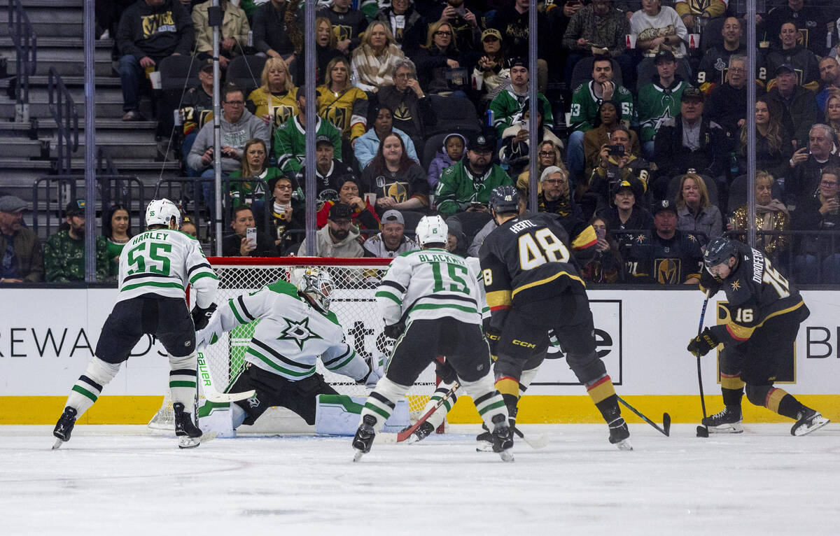 Golden Knights left wing Pavel Dorofeyev (16) sets up a goal shot for a score over Dallas Stars ...